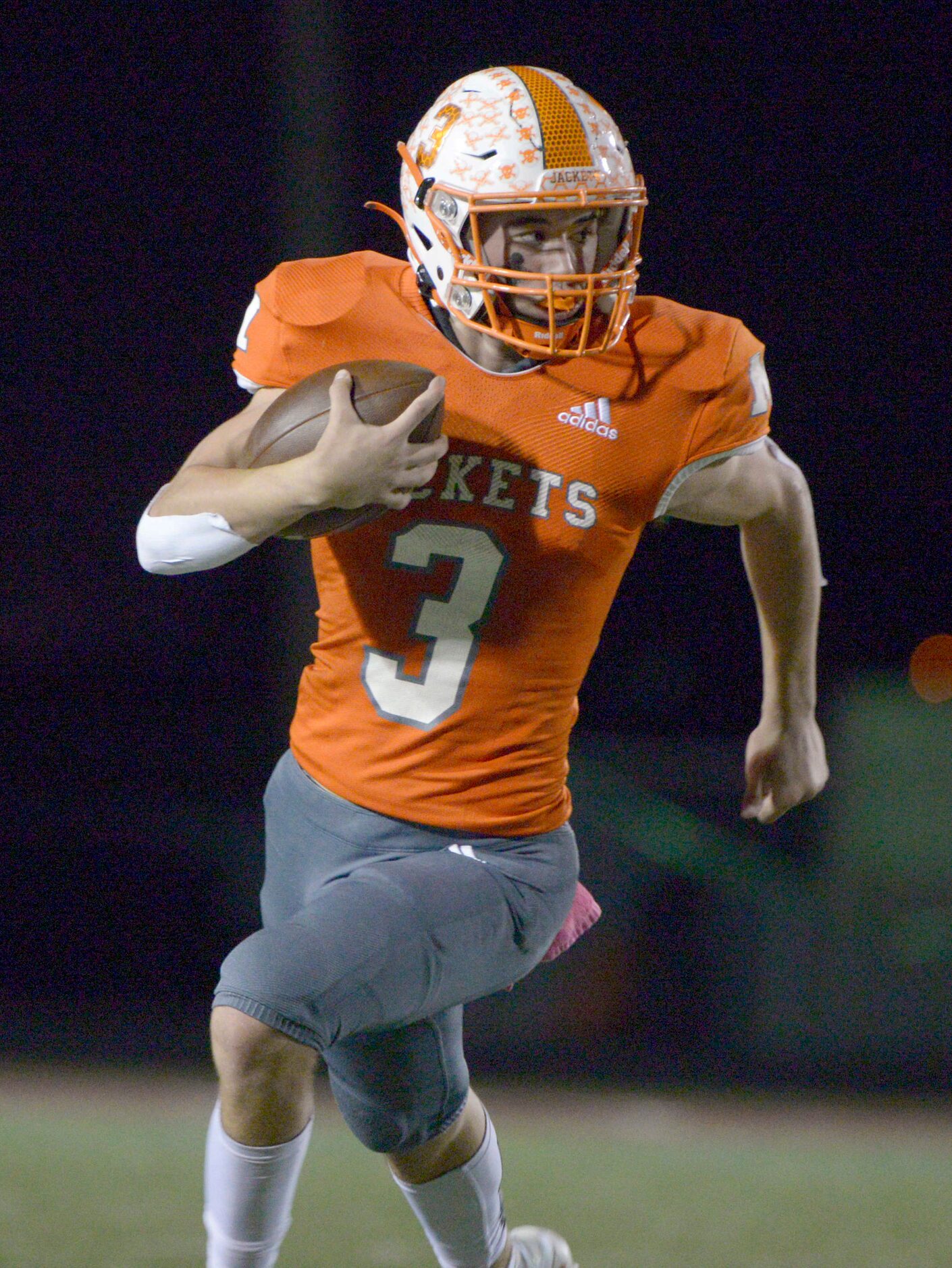 Mineola quarterback TJ Moreland runs upfield in the second quarter during a Class 3A...