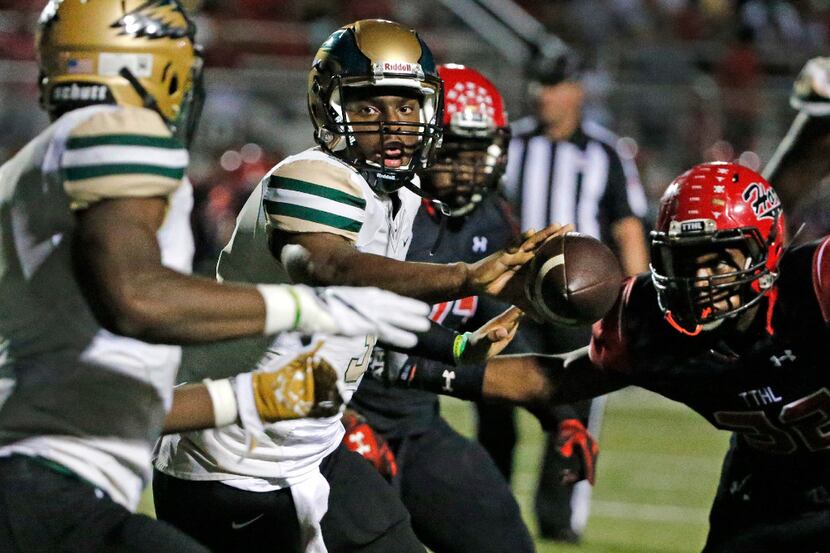 DeSoto quarterback Shawn Robinson (3) is pictured in action during the DeSoto High School...