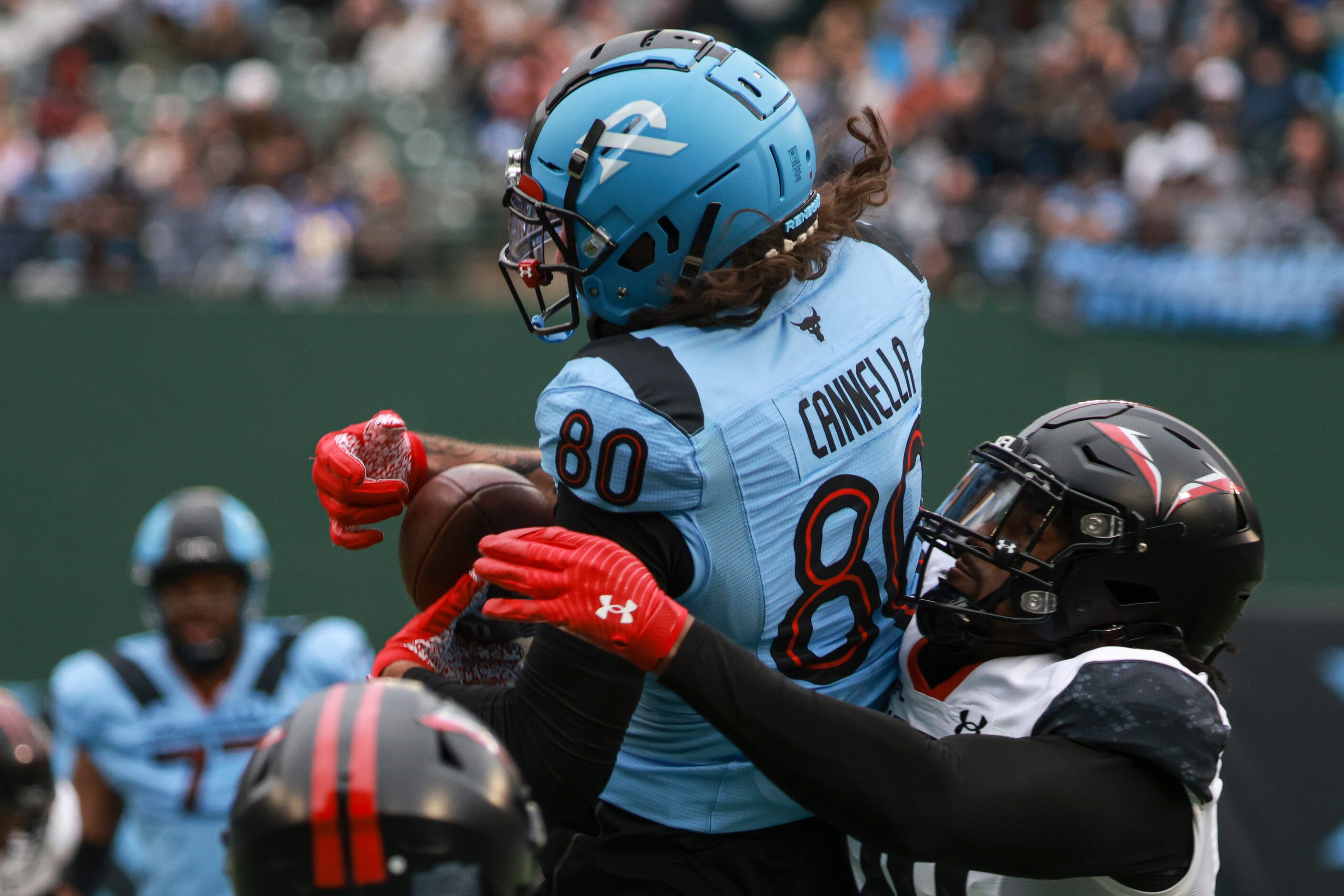 Arlington Renegades tight end Sal Cannella (80) looses control of the ball after a pass from...