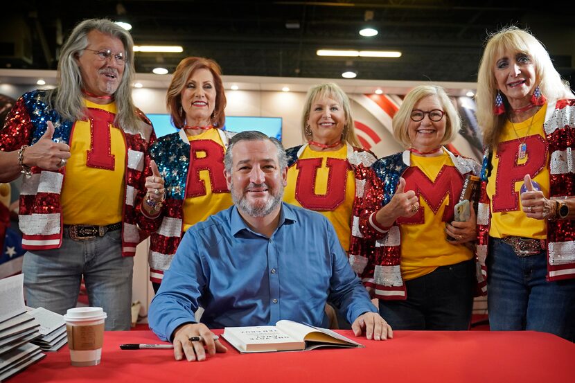 Supporters of former President Donald Trump lined up behind Sen. Ted Cruz, R-Texas, during a...