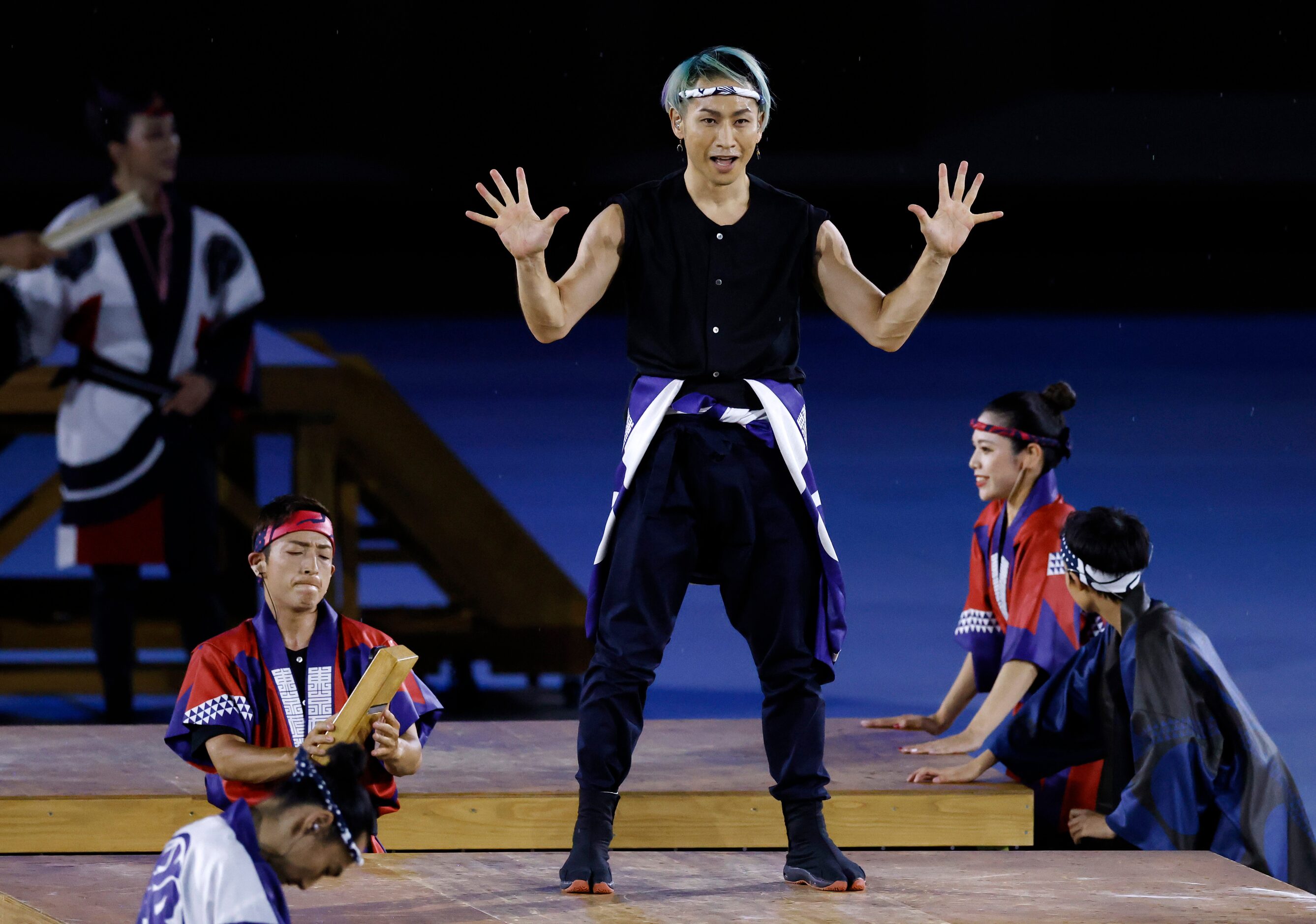 Dancers performs during the opening ceremony for the postponed 2020 Tokyo Olympics at...