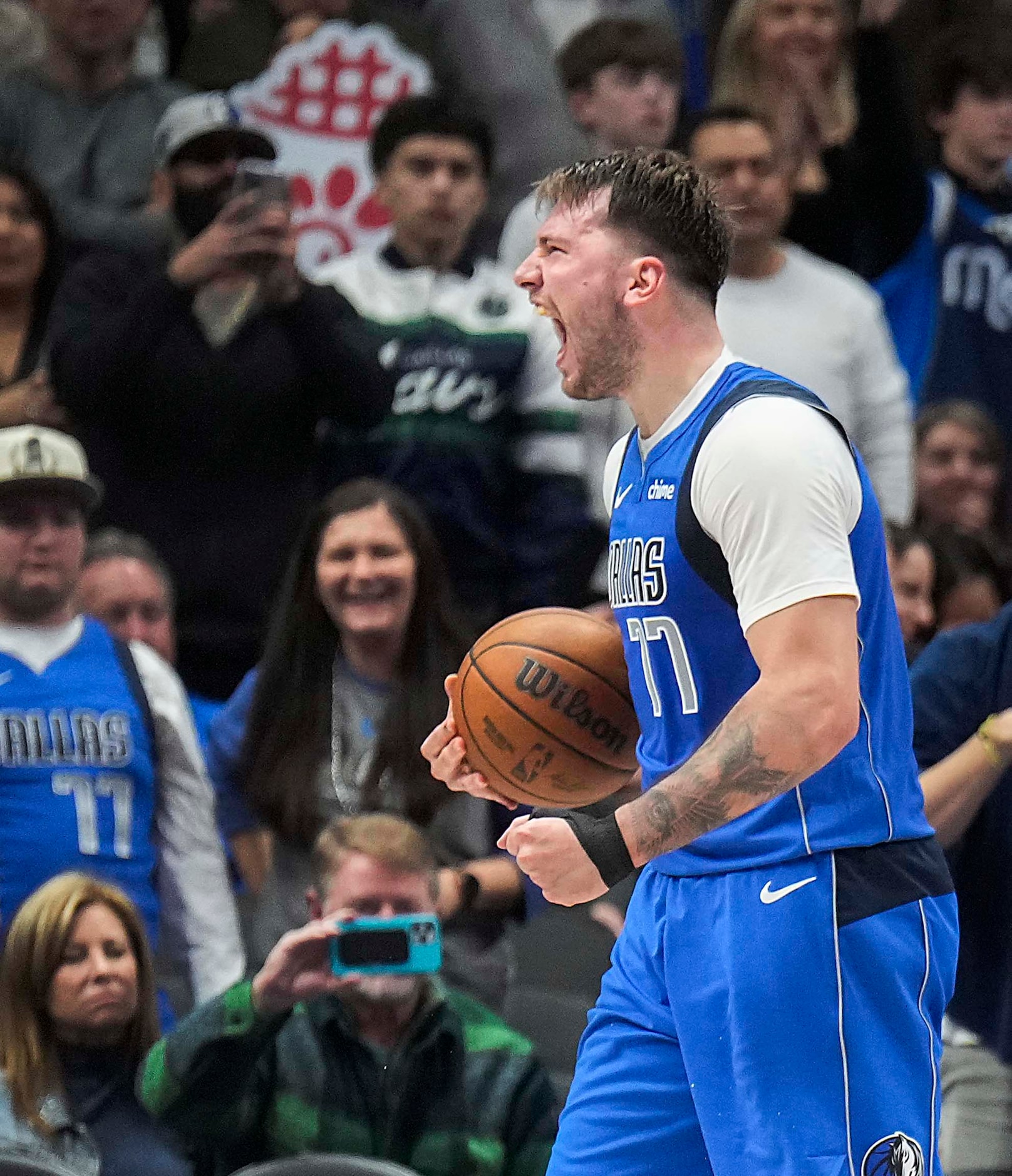 Dallas Mavericks guard Luka Doncic celebrates after turnover by the Oklahoma City Thunder...