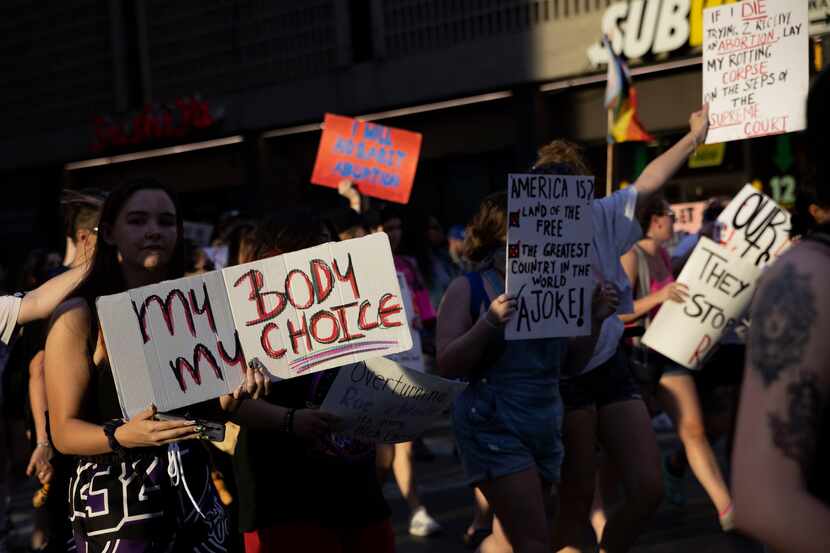 Protestors march for abortion rights a week after the Supreme Court overturned Roe v. Wade...