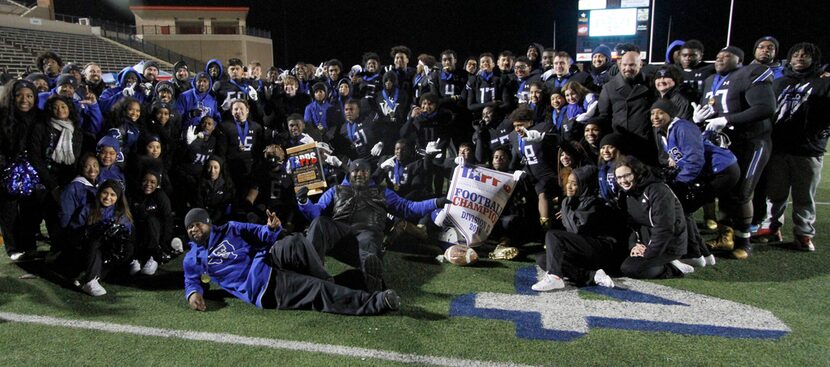 Members of the TC-Cedar Hill football team and coaches were joined by cheerleaders for a...