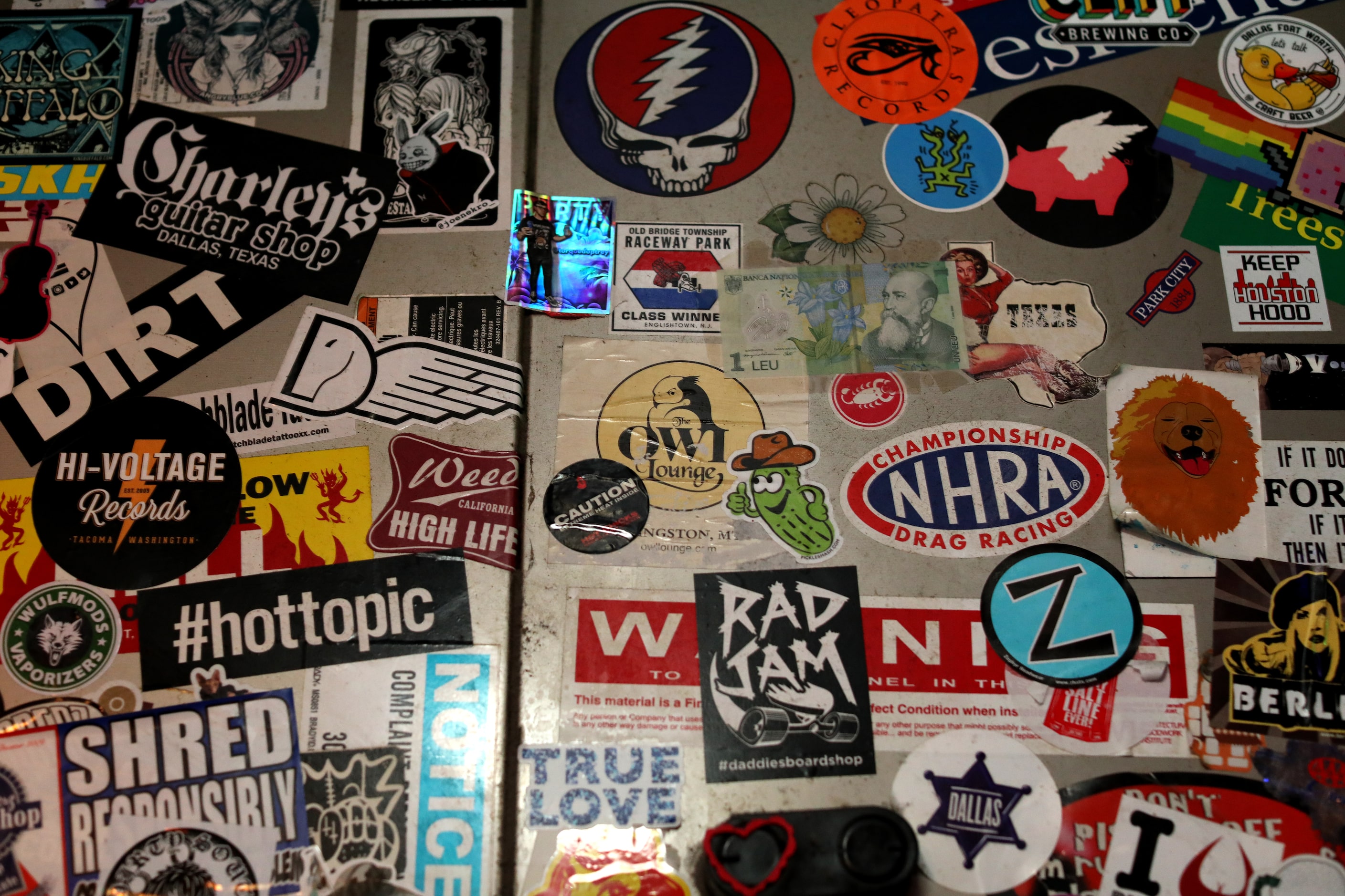 Random stickers on the ceiling vents at the Grapevine Bar in Dallas, TX, on Aug 23, 2023. ...