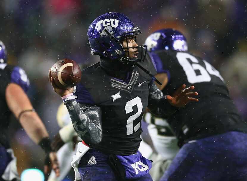 FORT WORTH, TX - NOVEMBER 27:  Trevone Boykin #2 of the TCU Horned Frogs throws against the...