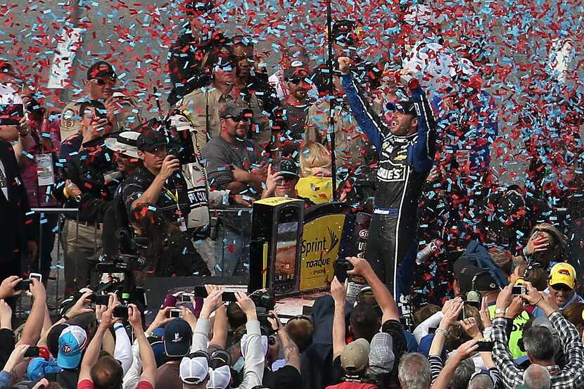 RIDGEWAY, VA - APRIL 07:  Jimmie Johnson, driver of the #48 Lowe's Chevrolet, celebrates in...