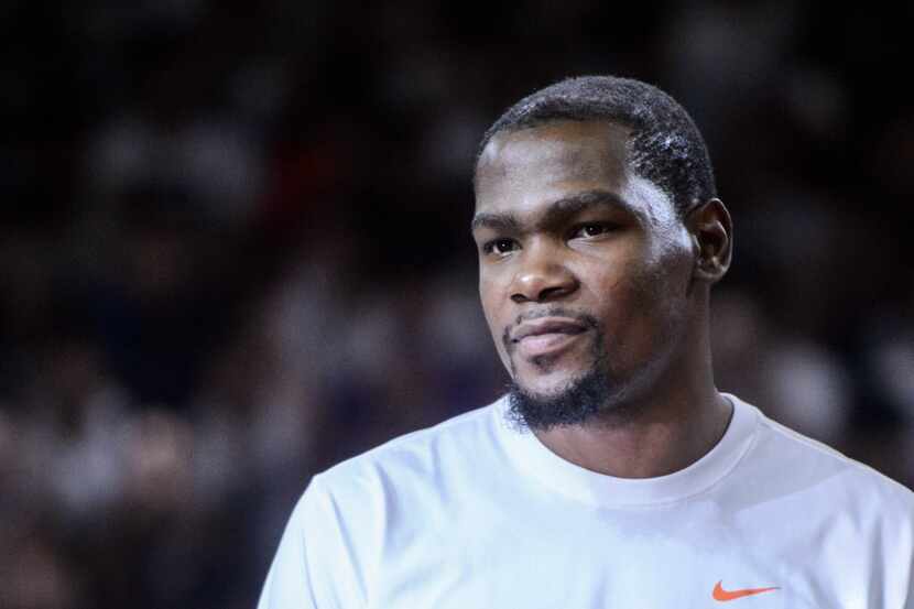 US NBA basketball player Kevin Durant #35 of the Oklahoma City Thunder looks on at a...