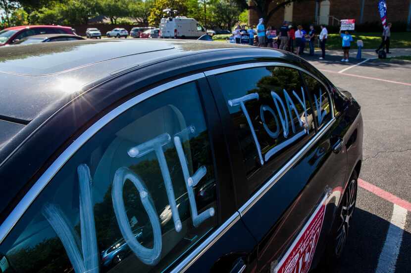 A car marked "Vote Today" was parked outside an early voting polling place on May 17, 2018,...