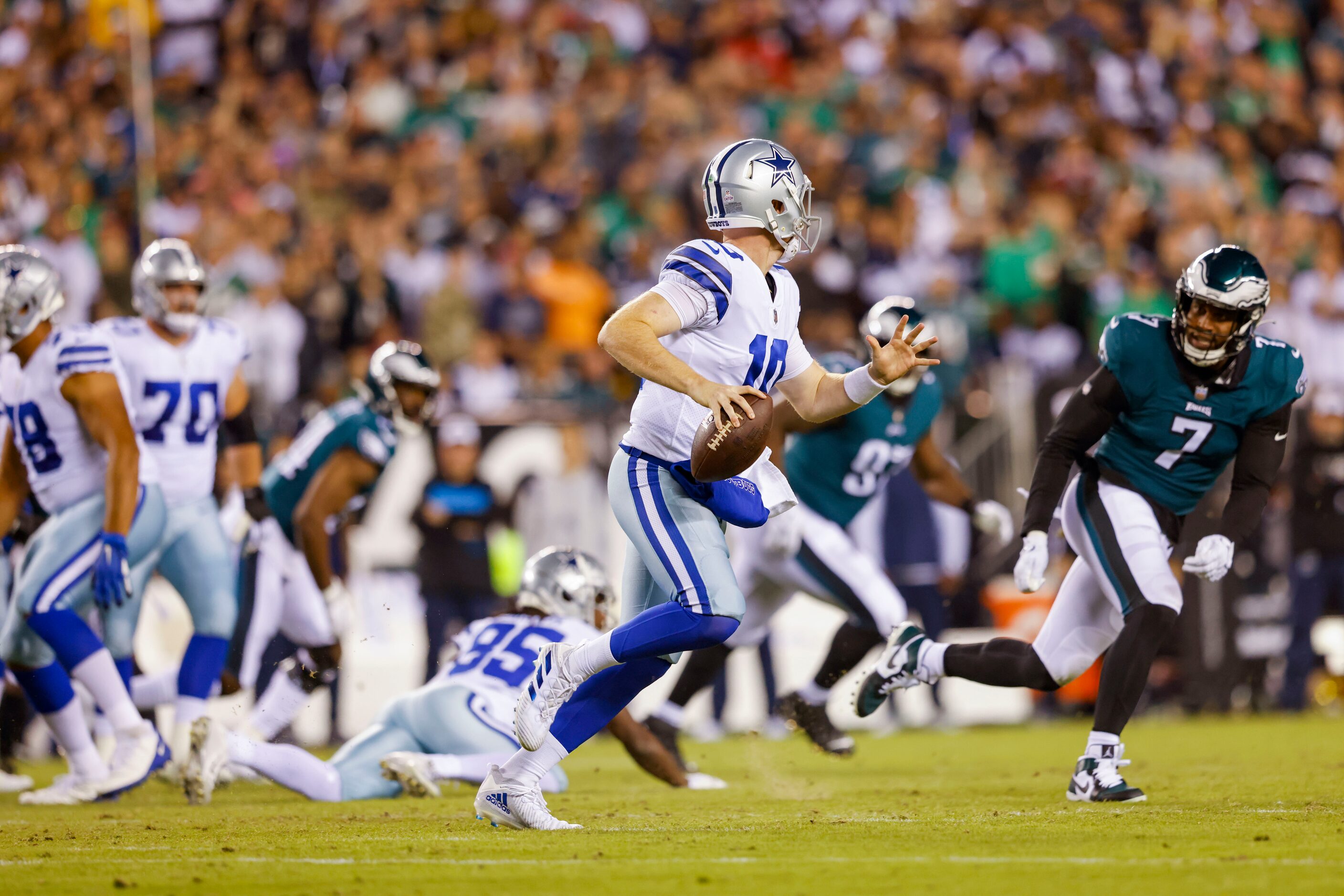 Dallas Cowboys quarterback Cooper Rush (10) looks to pass against the Philadelphia Eagles...