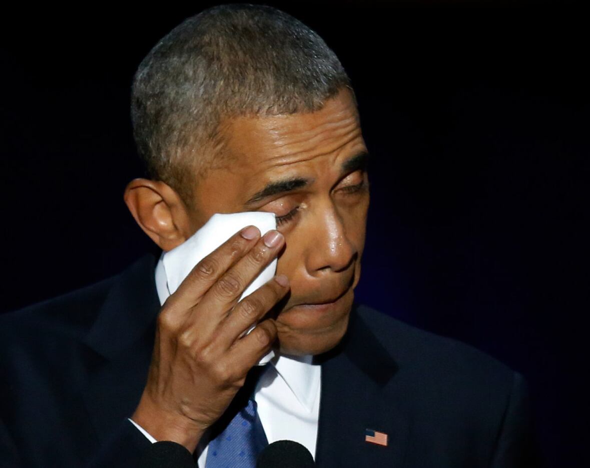 Obama paused for a few seconds and pressed his lips together to regain his composure while...