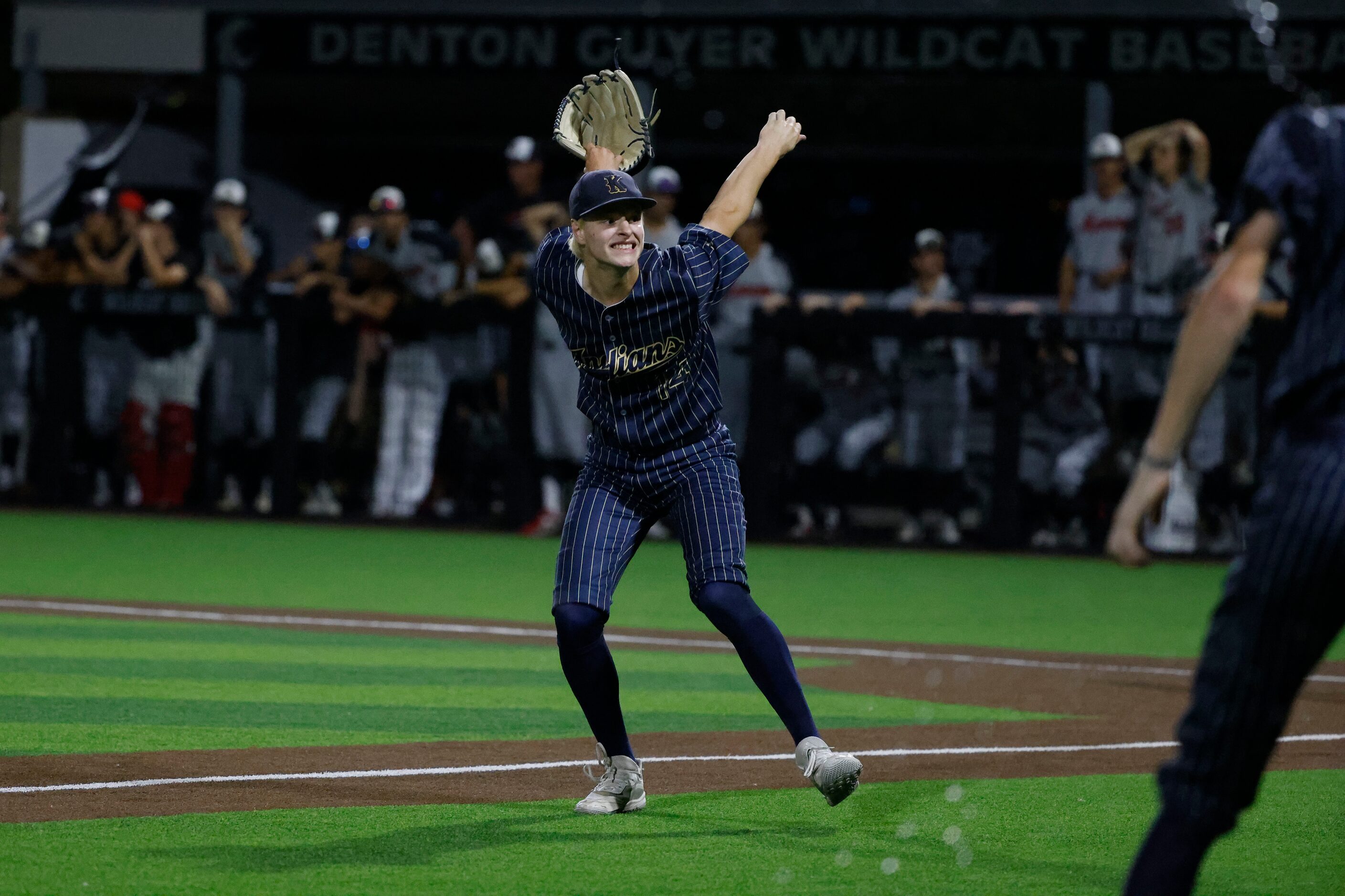 Keller pitcher Nicolas Robb (14) celebrates as they defeated Flower Mound Marcus 4-2 during...