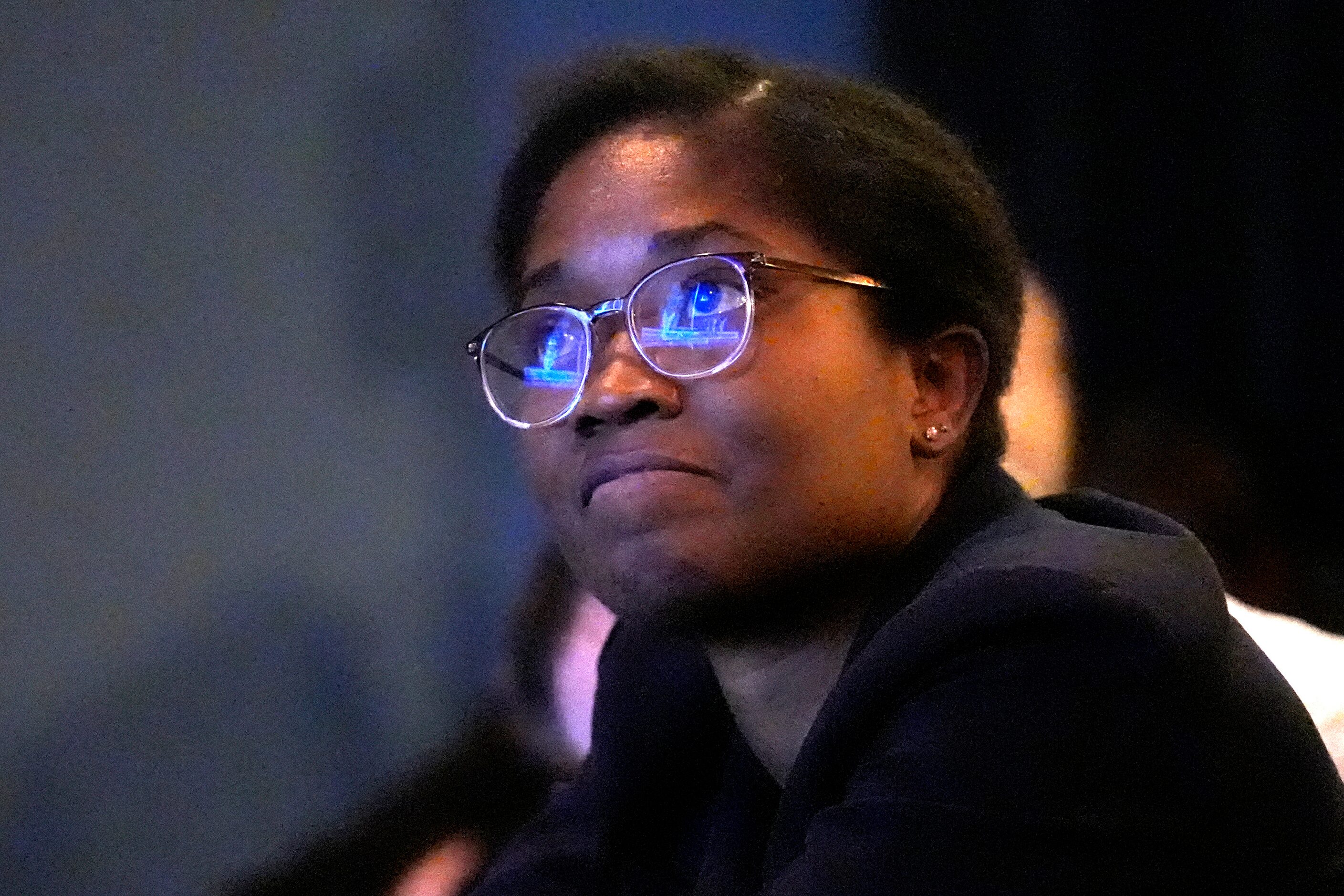 Colorado State Rep. Junie Joseph watches the presidential debate between Republican...