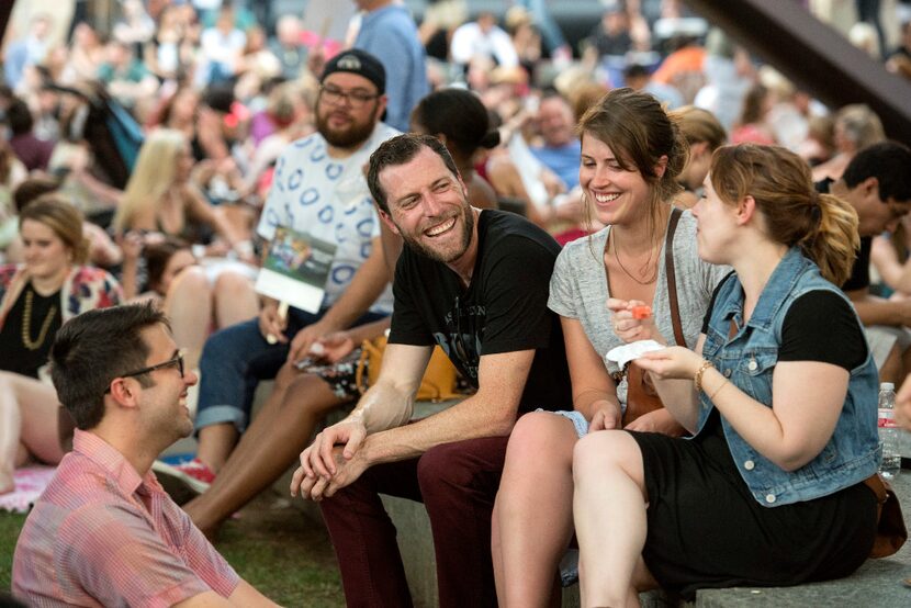 Russ Connell, Chris Weaver, Sara Easterling and Amanda Corbett, left to right, chat during a...