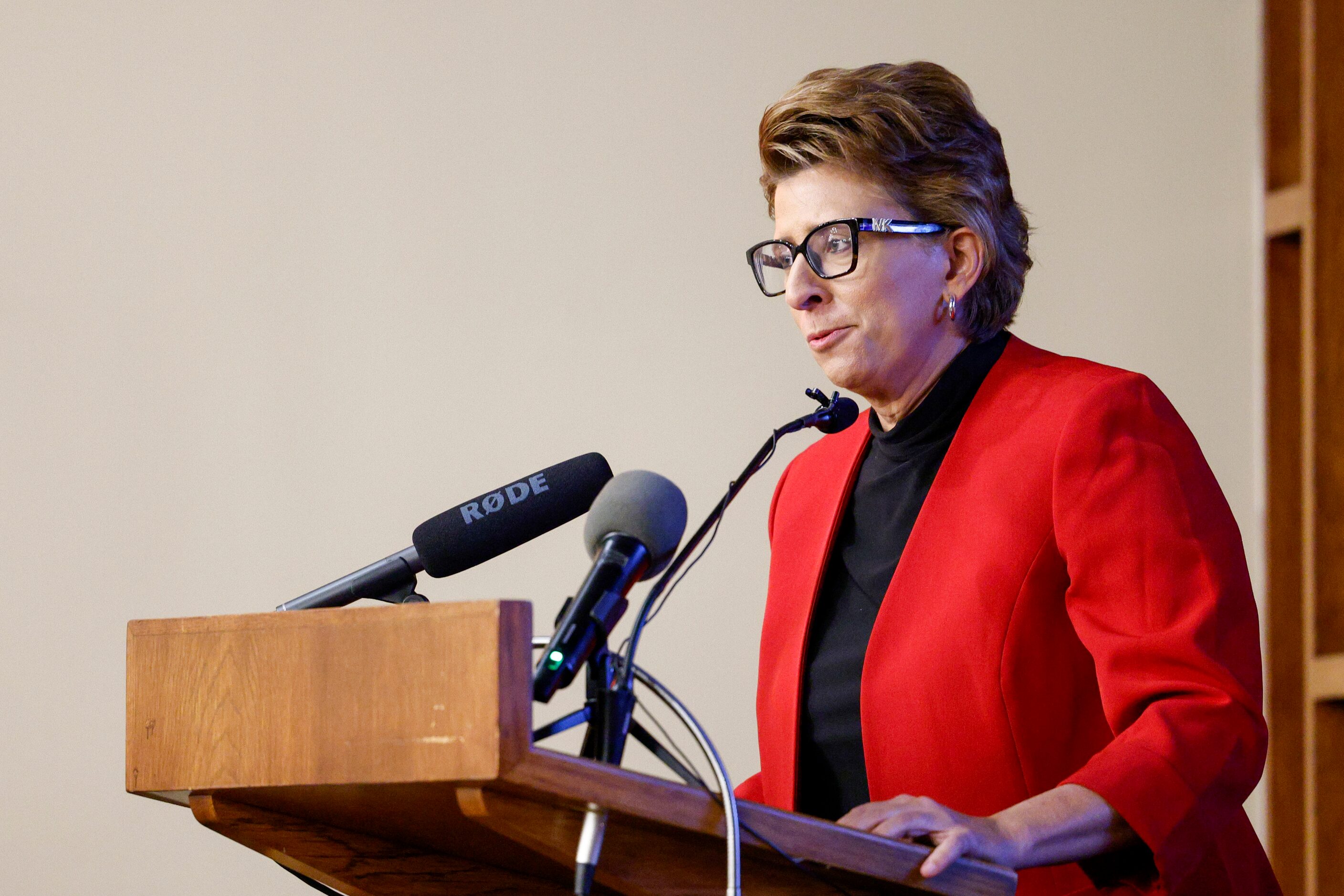 WFAA-TV reporter Tanya Eiserer speaks during a funeral service for former Dallas police...