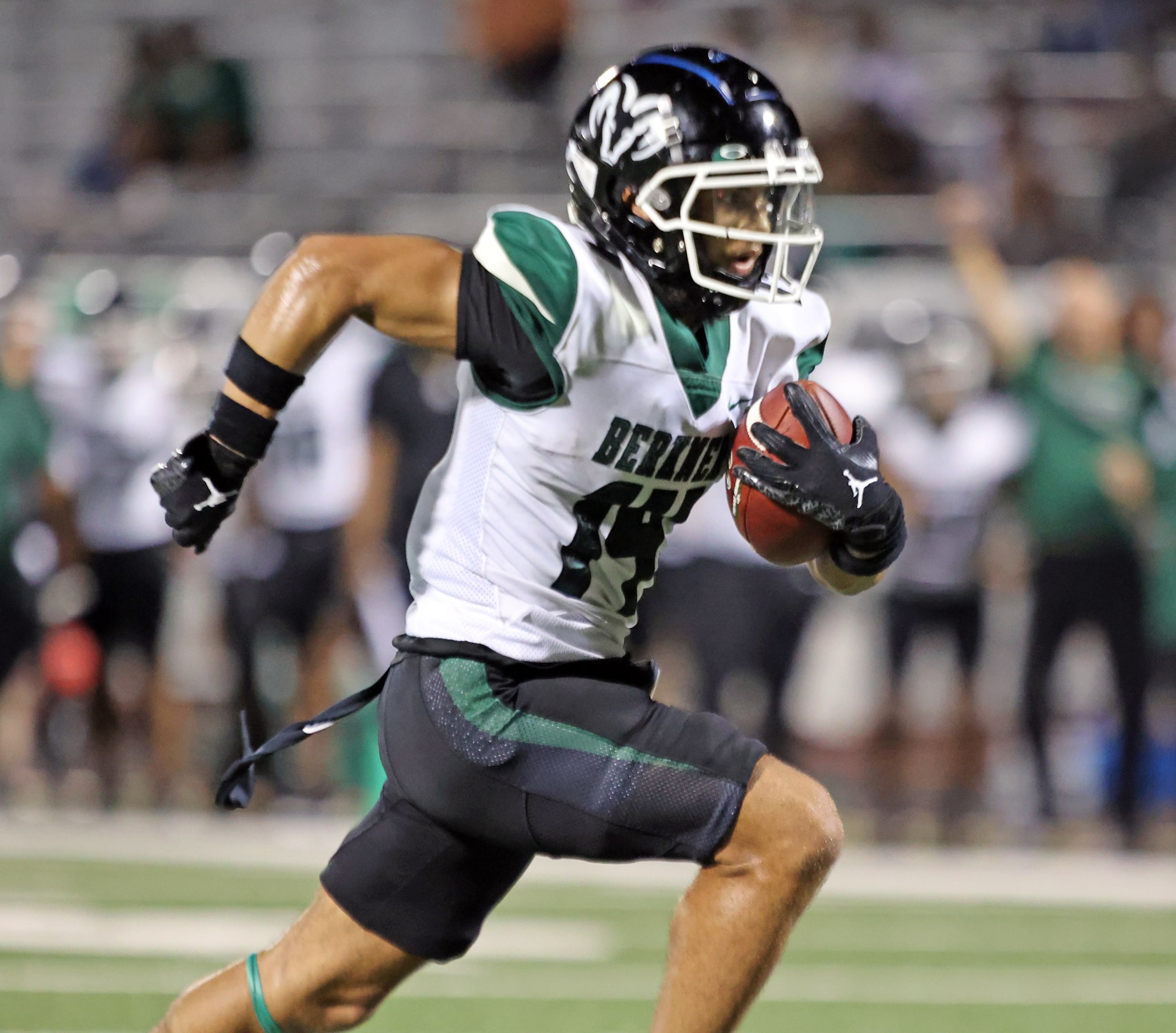 Richardson Berkner High Jayden Norwood (14) advances a catch for a touchdown during the...