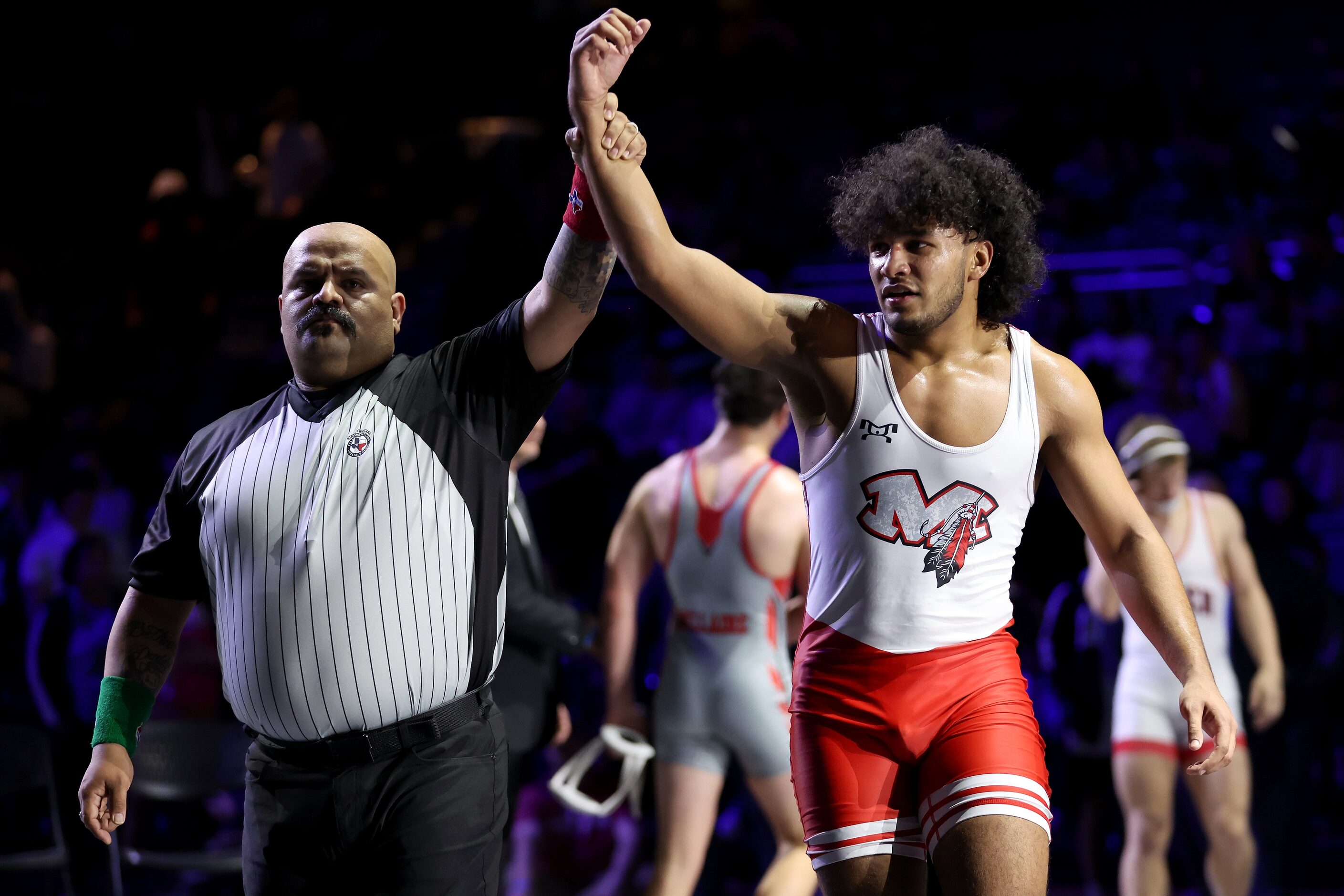 Ibraheem Ahmed of Arlington Martin (red) defeats Rocco Grazier of Houston Bellaire in the...