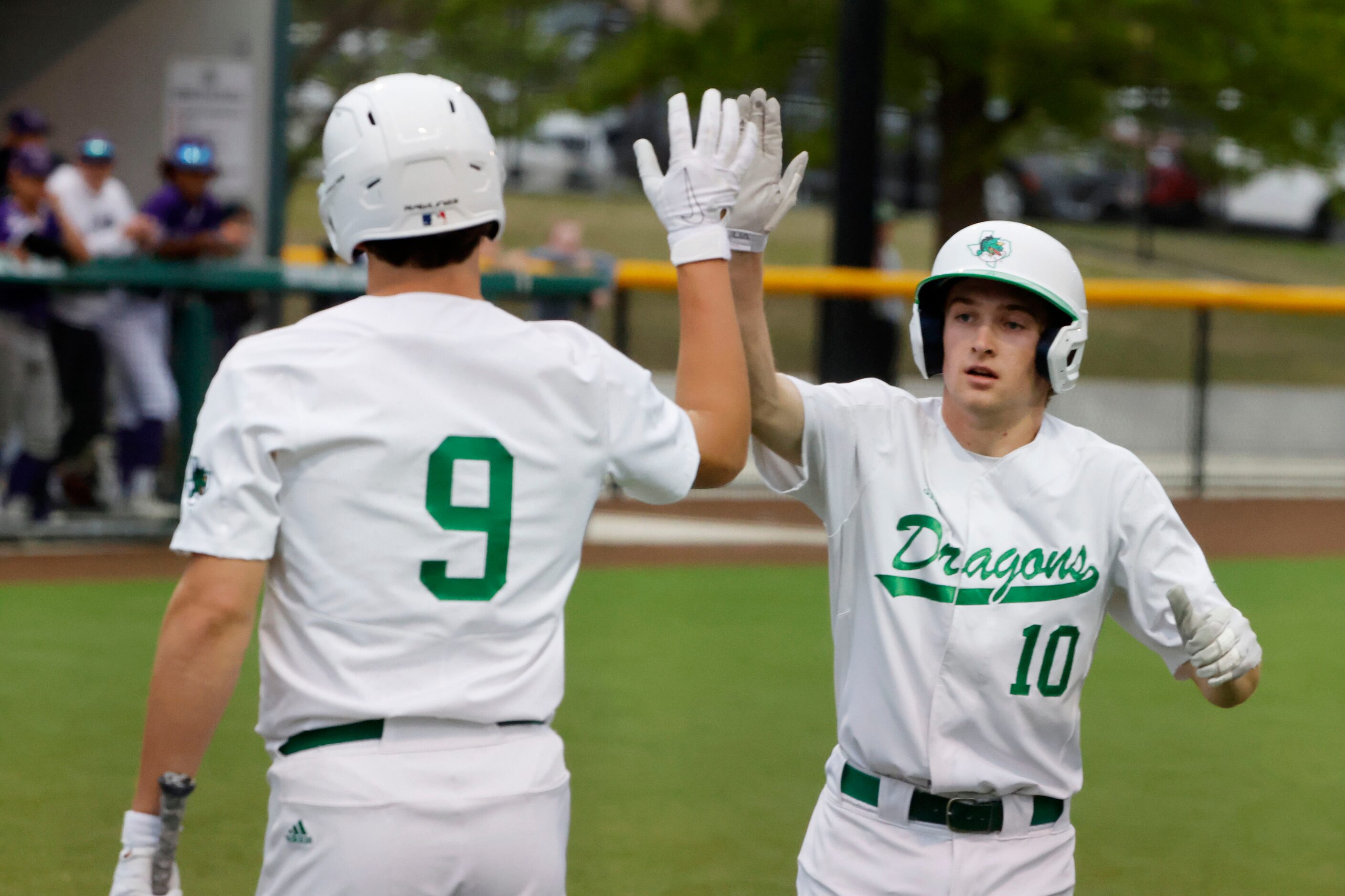 Southlake Carroll’s Owen Proksch (9) congratulates Spencer Simpson(10) as he scored against...