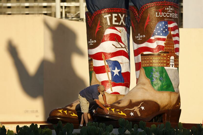 BOOT SCOOTIN': Big Tex's boots are 10 feet, 6 inches long and weight about 900 pounds each....
