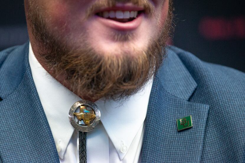 Sam Tecklenburg, an offensive lineman for Baylor, wears a bolo tie during the Big 12...