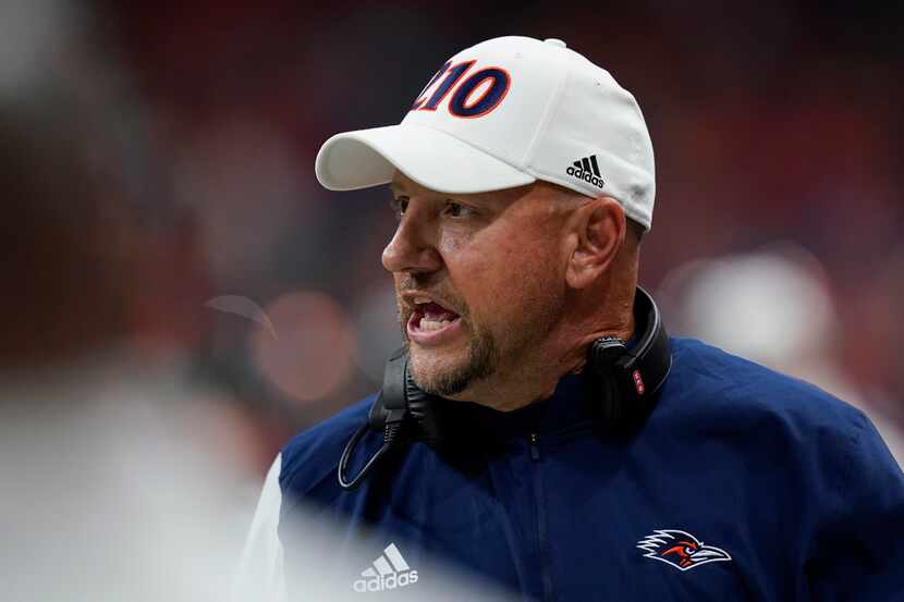 UTSA head coach Jeff Traylor argues a call during the first half of an NCAA college football...