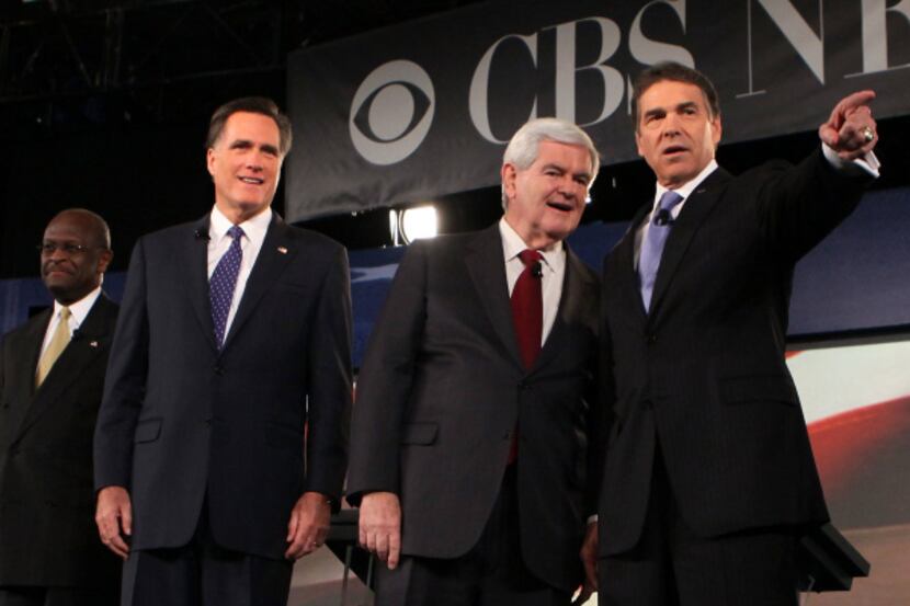 From left: Republican presidential candidates Herman Cain, Mitt Romney, Newt Gingrich and...