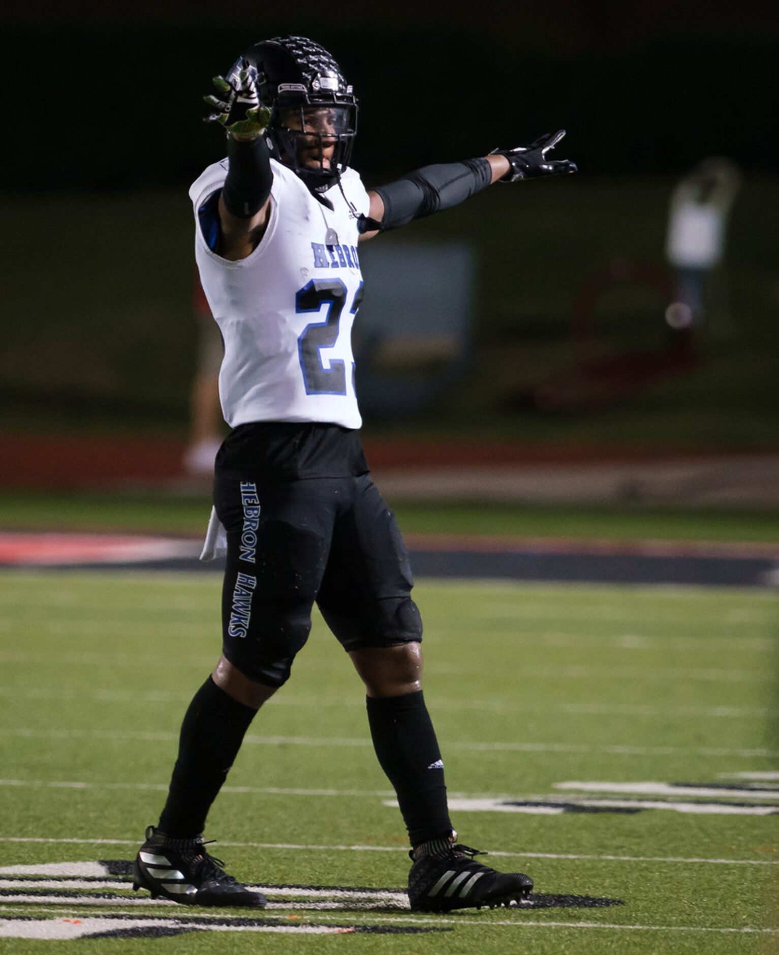 Hebron defensive back Darius Snow (23) celebrates a play during the second half of a high...