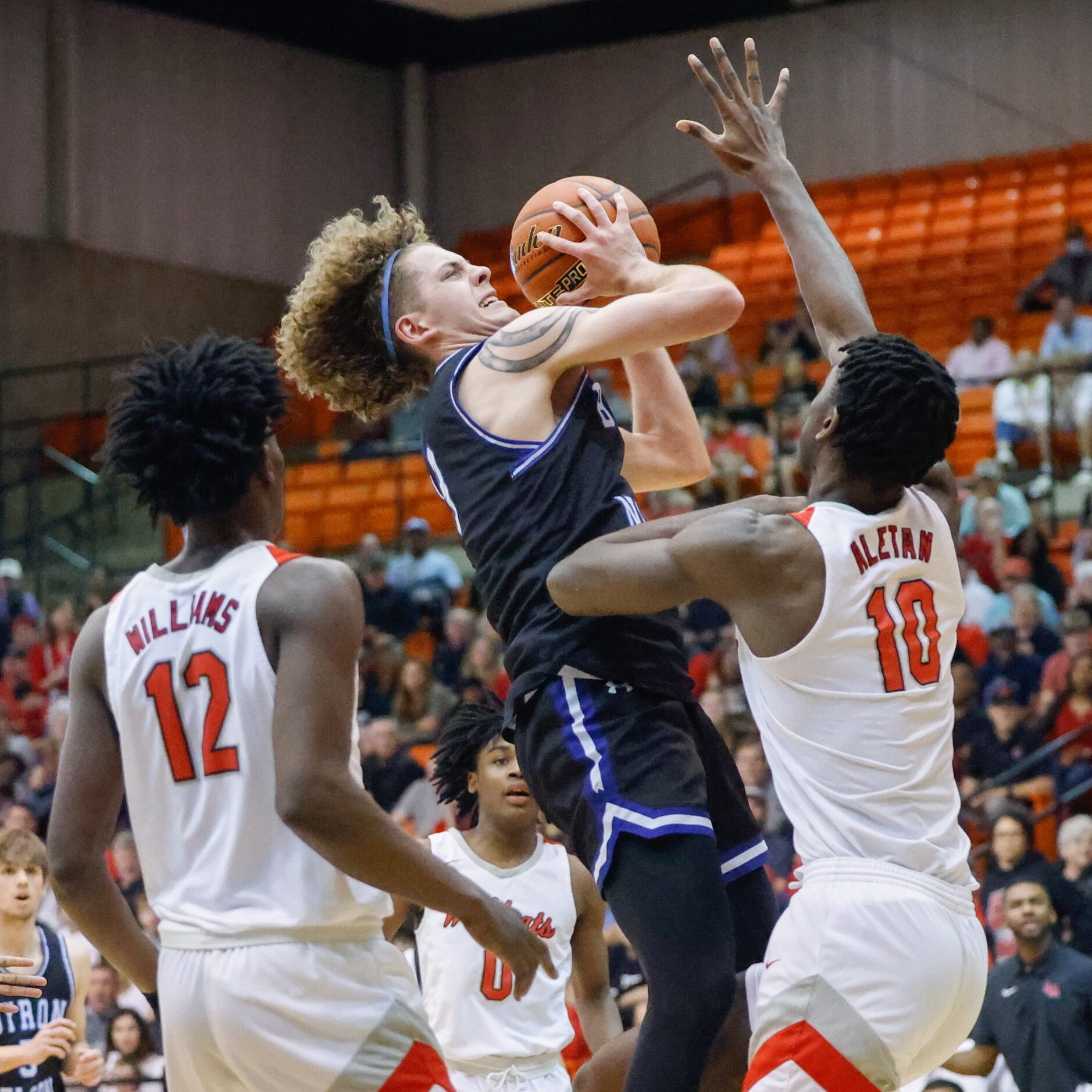 Byron Nelson High School' Finley Bizjack (3) goes for a shot against Lake Highlands High...