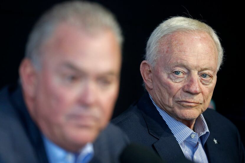 Dallas Cowboys Owner Jerry Jones, right, watches Executive Vice President, CEO, and Director...