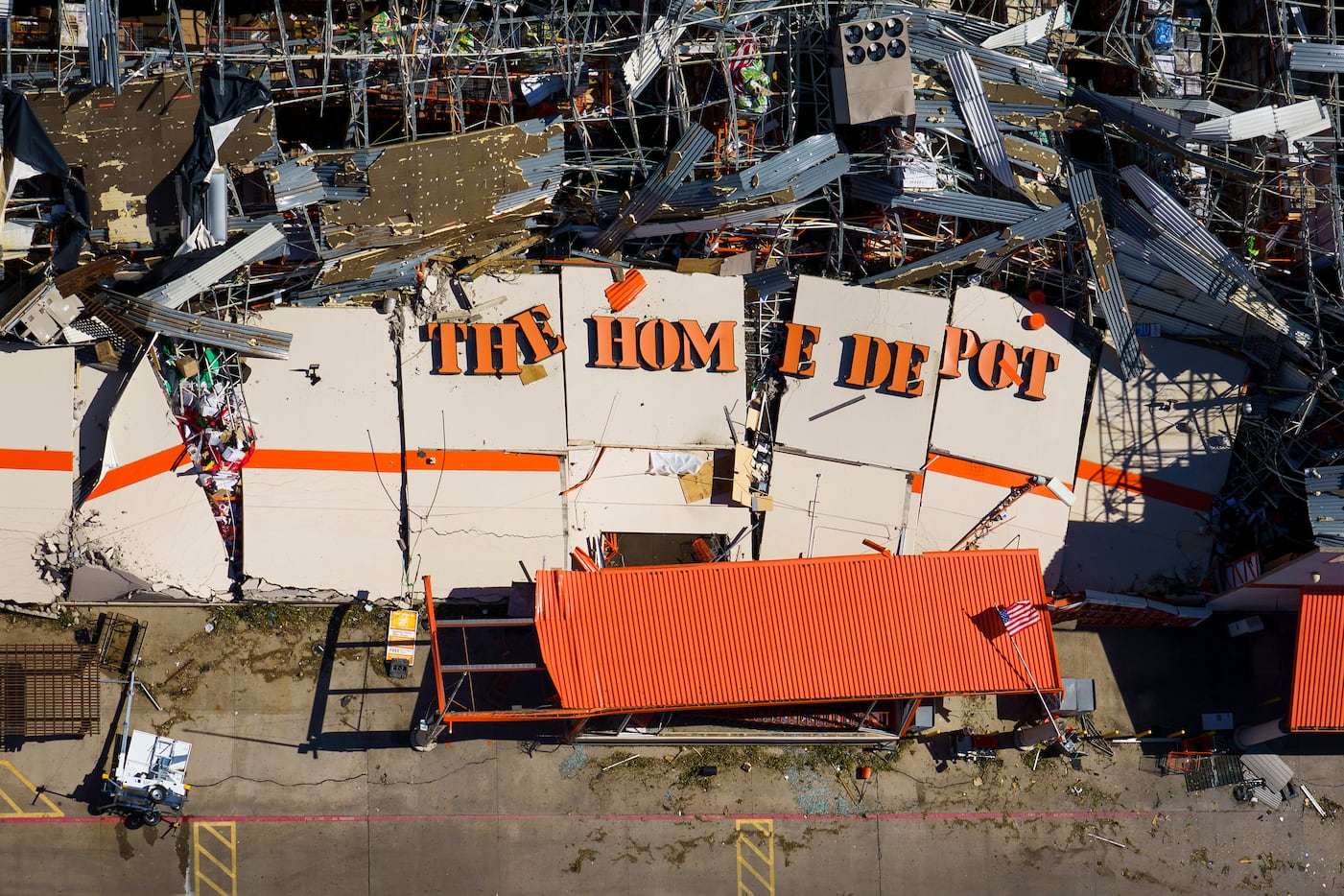 The destroyed Home Depot store at 11682 Forest Central Drive is seen after tornado damage on...