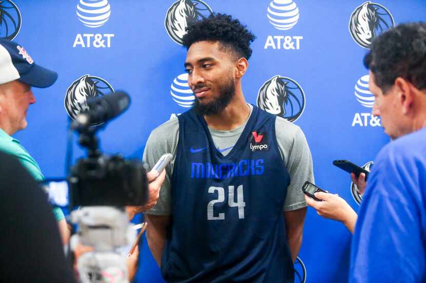 Guard Josh Reaves (24) answers questions from the media during the Dallas Mavericks Summer...