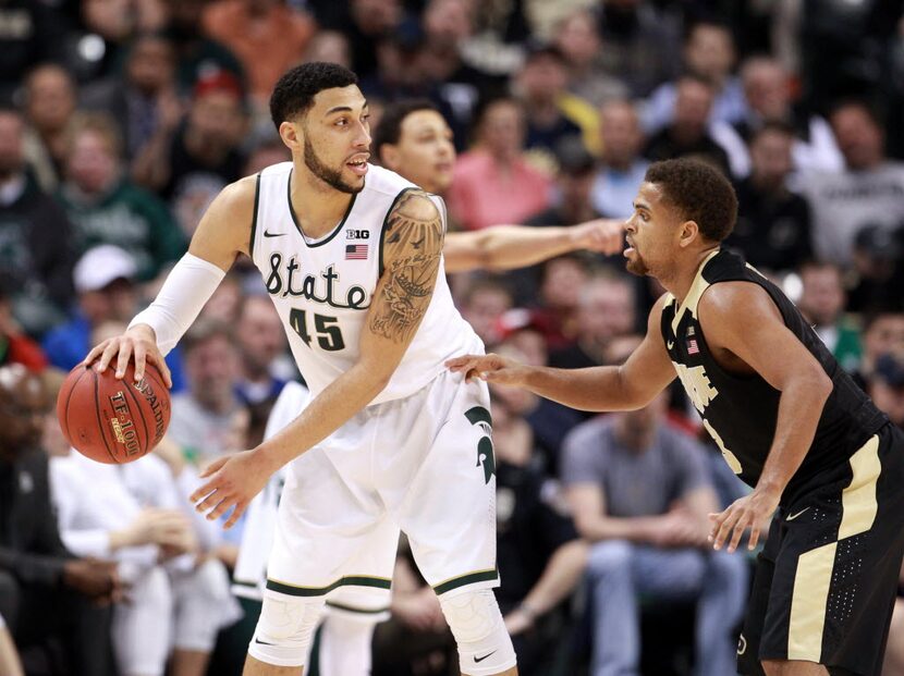 Mar 13, 2016; Indianapolis, IN, USA; Michigan State Spartans guard Denzel Valentine (45) is...