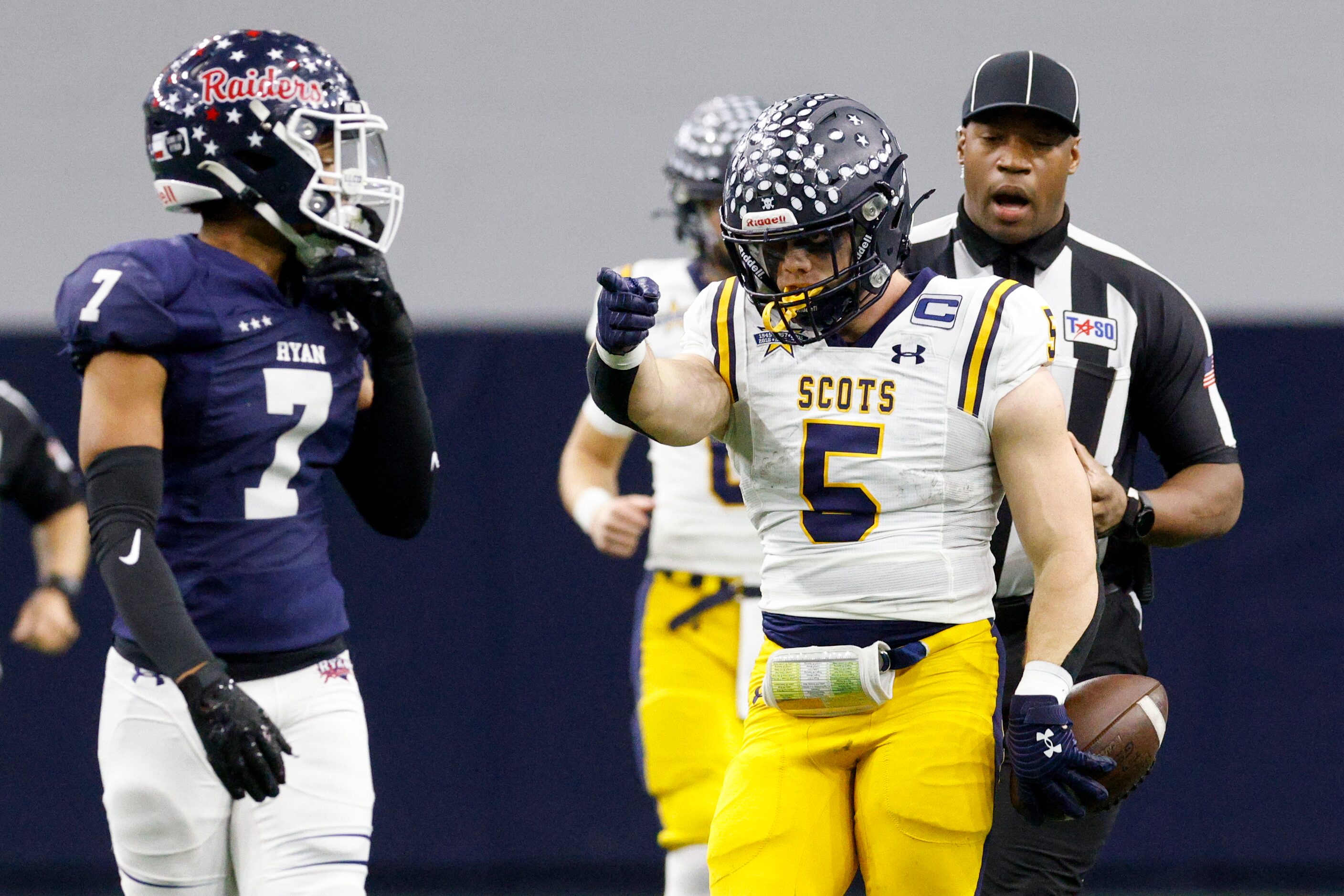 Highland Park running back James Lancaster (5) signals for a first down after a run during...