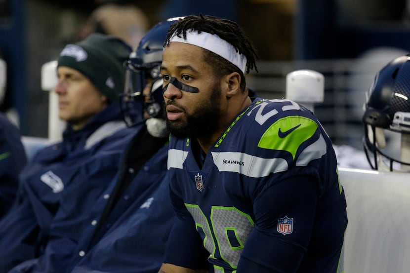 Seattle Seahawks free safety Earl Thomas sits on the bench in the second half of an NFL...