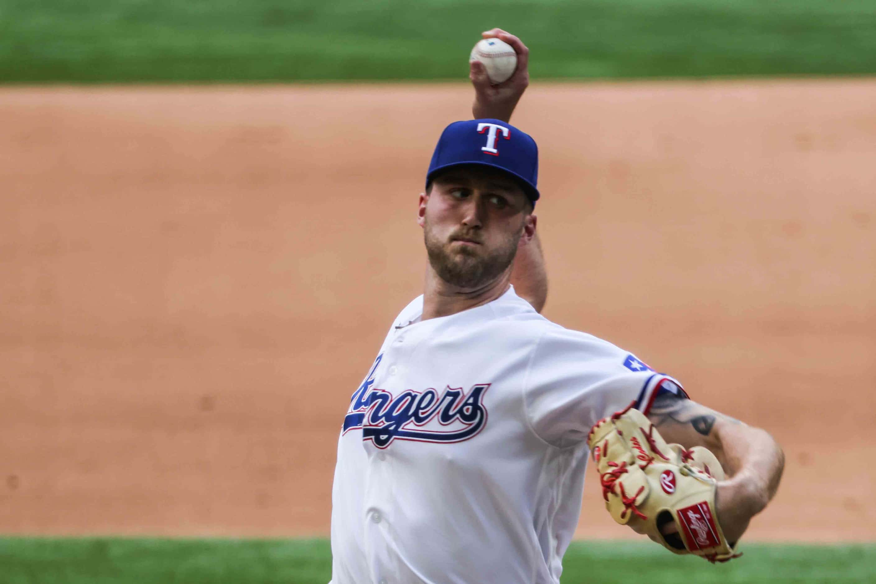Texas Rangers' Kyle Cody No. 54 pitches against Toronto Blue Jays at the Globe Life Field...