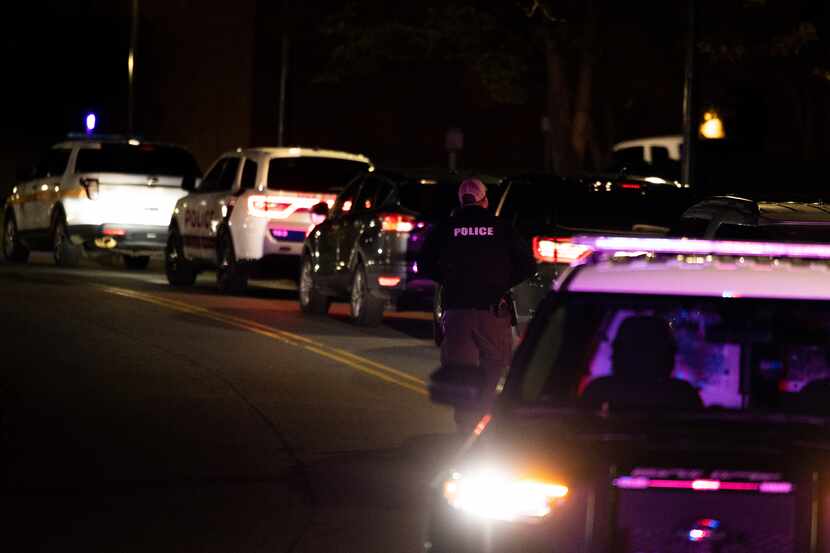 A police officer walks up Culbreath Road during an active shooter situation on the...