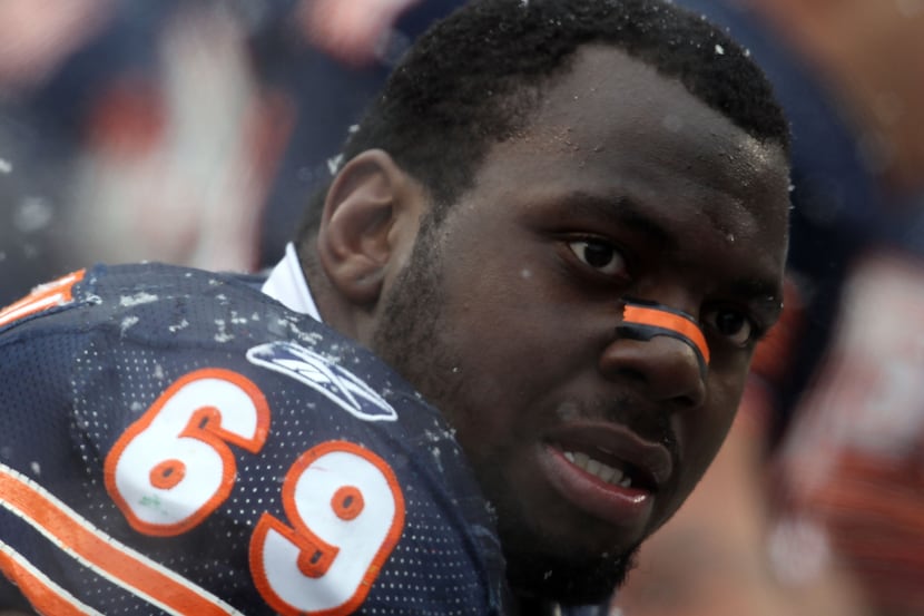 Henry Melton #69 of the Chicago Bears looks on from the bench against the Seattle Seahawks...