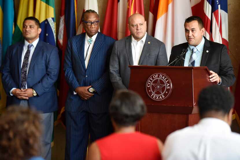 Dallas City Council member Adam Bazaldua of District 7 (right) conducted a news conference...