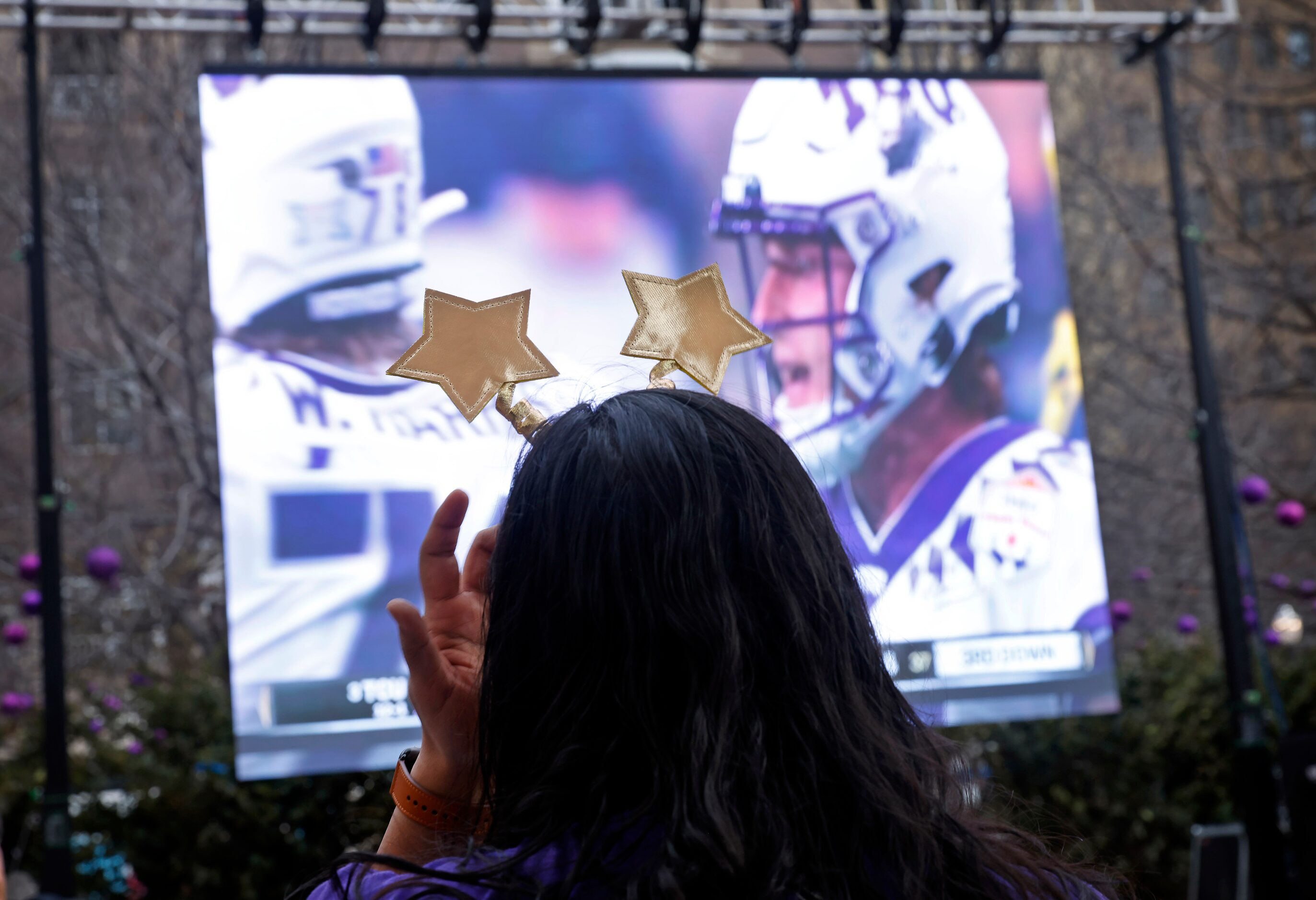 TCU Horned Frogs fans Wardah Iqbal donned a New Year’s head band during an outdoor CFP watch...