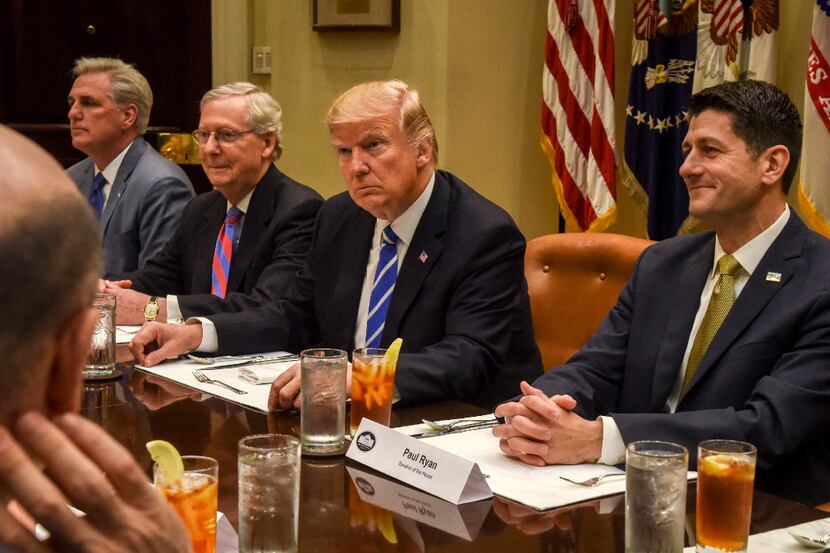 President Donald Trump with Republican leaders, including Senate Majority Leader Mitch...