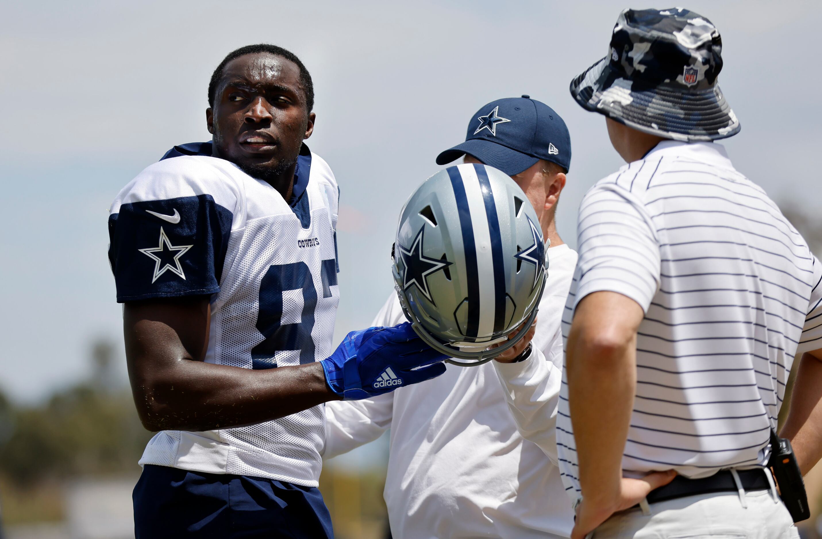 Cowboys training camp photos: Quarterback Dak Prescott rolls out to throw a  dime