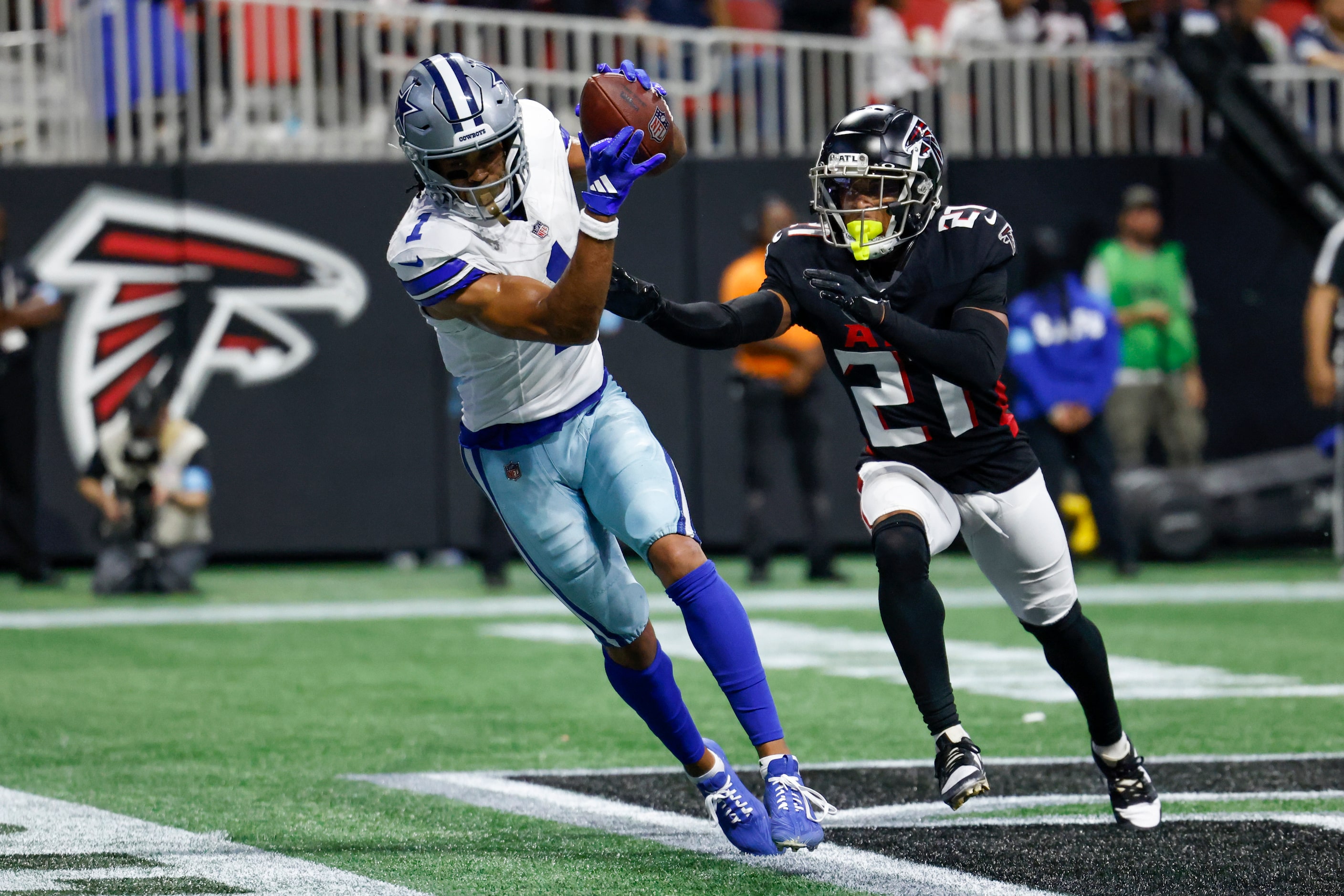 Dallas Cowboys wide receiver Jalen Tolbert (1) makes a catch for a touchdown ahead of...