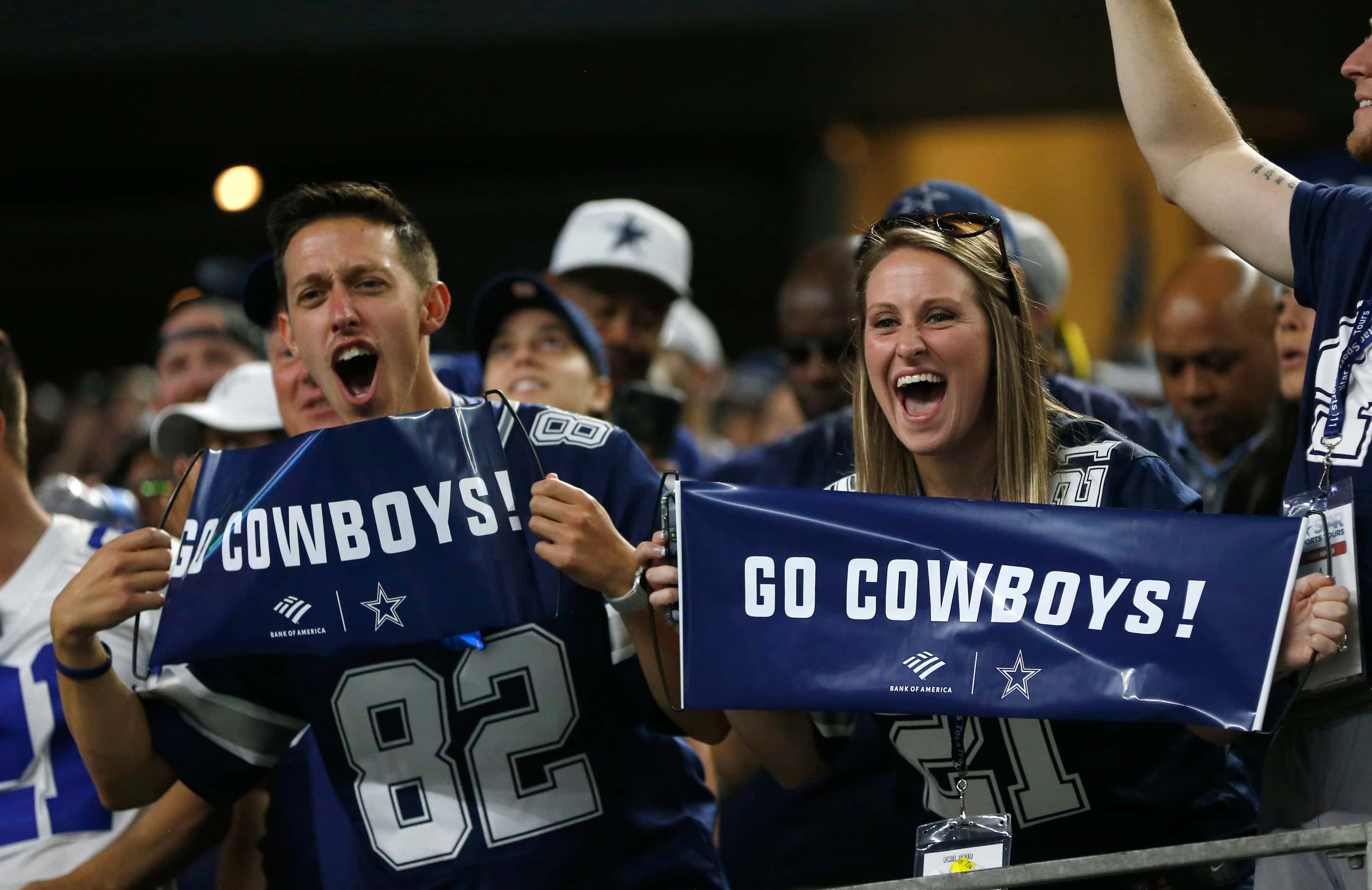 Dallas Cowboys fans cheer after a touchdown in a game against the Philadelphia Eagles during...