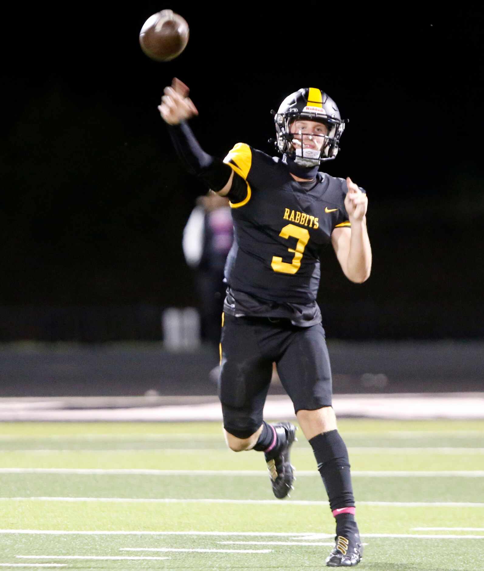 Forney high’s Kyle Crawford (3) throws a pass during the first half of a high school...