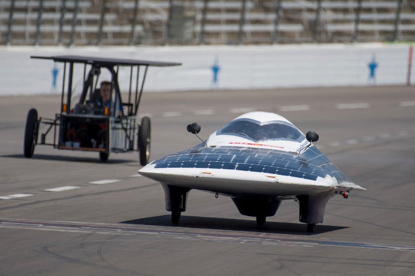The Covenant Christian Academy solar car (left) and the Staten Island solar car from Staten...