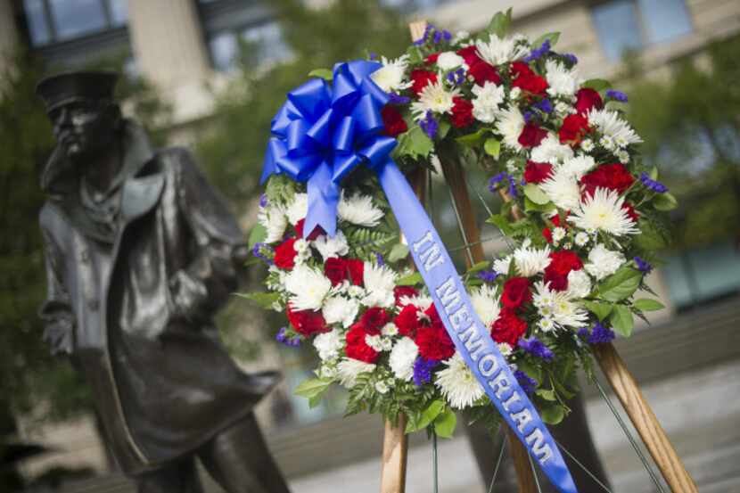 A wreath stands at the U.S. Navy Memorial  in Washington, after a ceremony to honor the...