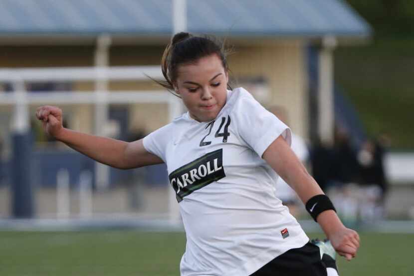 Southlake Carroll forward Taylor Tufts (24) kicks the ball against South Grand Prairie in...