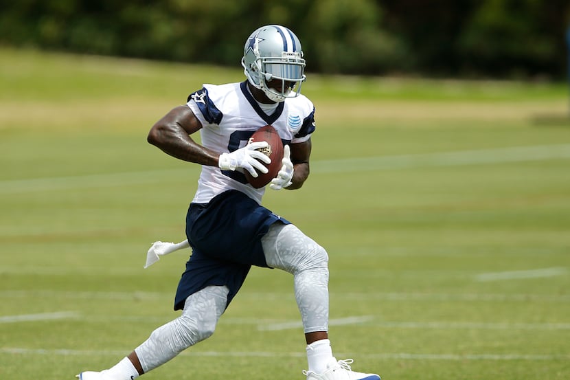 Dallas Cowboys wide receiver Dez Bryant (88) makes a catch during OTA drills at Valley...