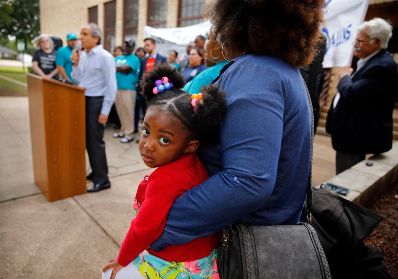 Joi Murrel, 2, joined her mother, Shatrease Murrel, at Thursday's news conference announcing...
