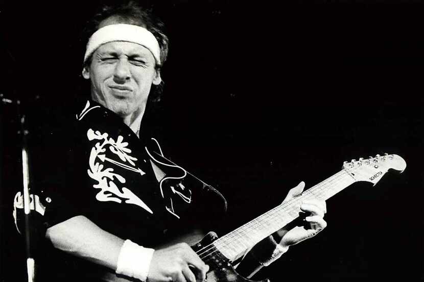 Mark Knopfler and Dire Straits perform at Reunion Arena in 1985. Dire Straits belong in the...